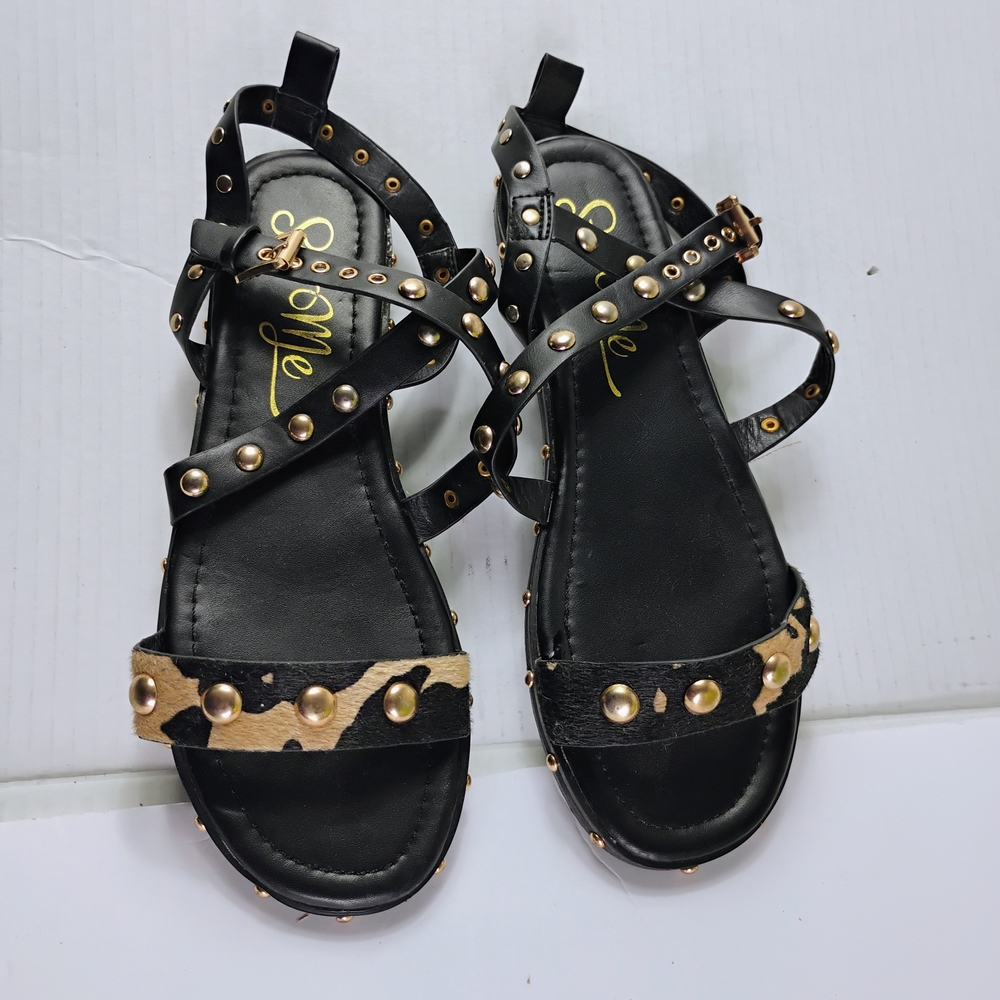 black studded gladiator sandals with a leopard print accent strap